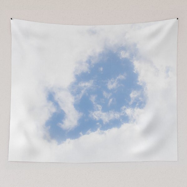 Item preview, Blue sky through the eye of glowing white fluffy clouds. designed and sold by James-Cole.