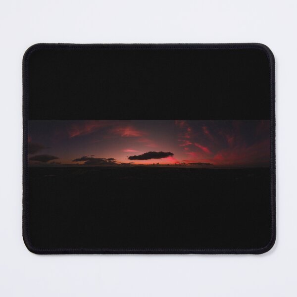 Item preview, Deep reds and purples panoramic view of silhouetted clouds at the sunset afterglow designed and sold by James-Cole.