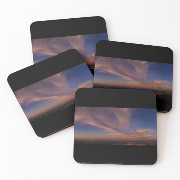 Item preview, Fluffy pink clouds at sunset against a deep blue sky aerial panoramic designed and sold by James-Cole.