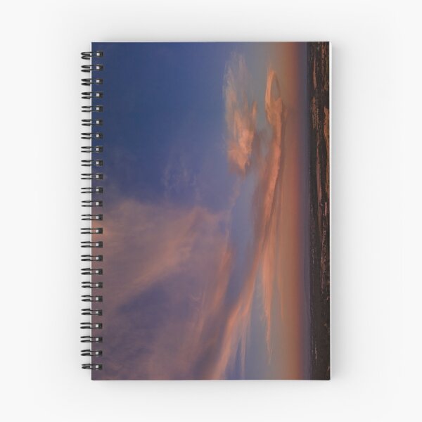 Item preview, Fluffy pink clouds at sunset against a deep blue sky aerial panoramic designed and sold by James-Cole.