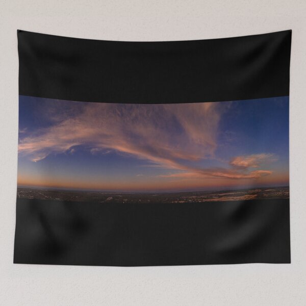 Item preview, Fluffy pink clouds at sunset against a deep blue sky aerial panoramic designed and sold by James-Cole.
