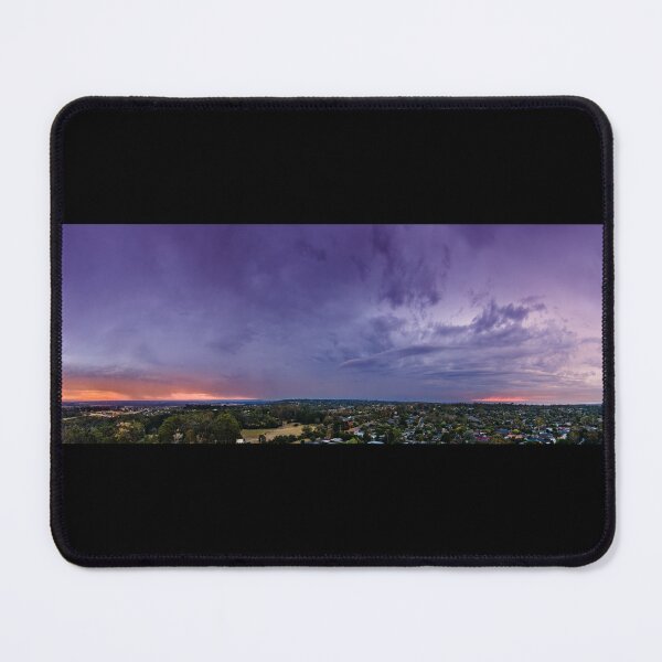 Item preview, Stormy rain clouds in the afterglow of sunset glowing purple, blue and orange aerial panoramic designed and sold by James-Cole.