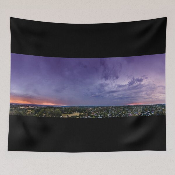 Item preview, Stormy rain clouds in the afterglow of sunset glowing purple, blue and orange aerial panoramic designed and sold by James-Cole.