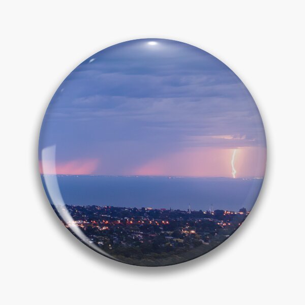 Item preview, Distant lightning strikes across Port Philip Bay seascape filled with stormy clouds and street lights aerial panoramic designed and sold by James-Cole.