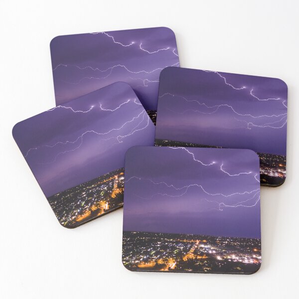 Item preview, Lightning bolt discharging in the stormy clouds above the street lights aerial nighttime shot designed and sold by James-Cole.