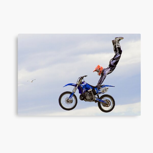 Biker in the sky Canvas Print
