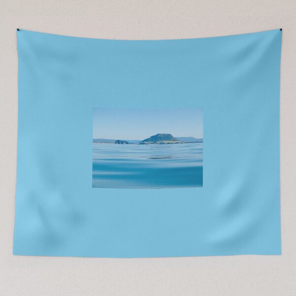 Item preview, Landmark Mount Maunganui at Tauranga New Zealand and background hills across calm idyllic blue sea designed and sold by Brian Scantlebury.