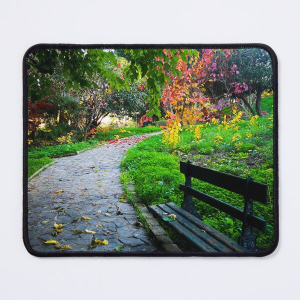 Item preview, Old Chair and Road near green trees and yellow red flowers in the secret garden designed and sold by anisbbmbrush.