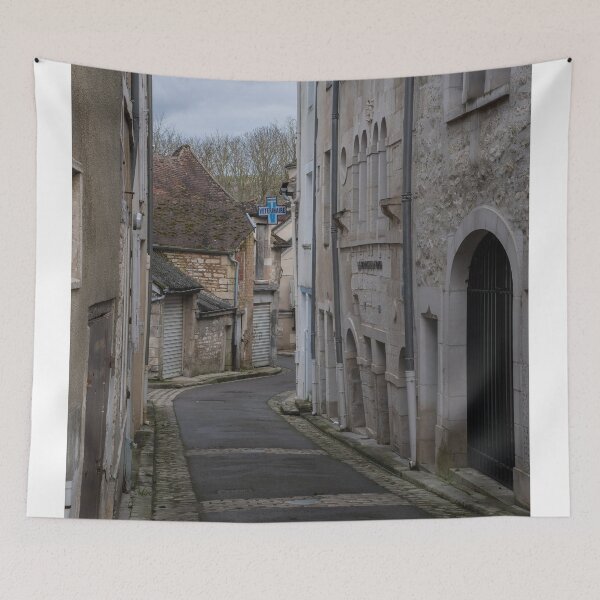 Item preview, Chablis is a town in the Bourgogne-Franche-Comte famous for its french white wine. Walking in narrow streets. (vertical) designed and sold by Maurizio Fabbroni.
