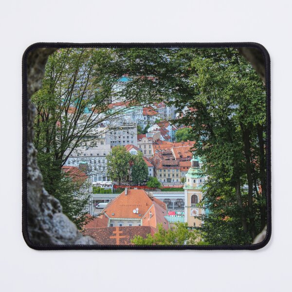 Item preview, A view of the old, medieval town of Ljubljana, through a canon whole on the wall of Ljubljana Castle, Slovenia designed and sold by SnapTPhotograph.