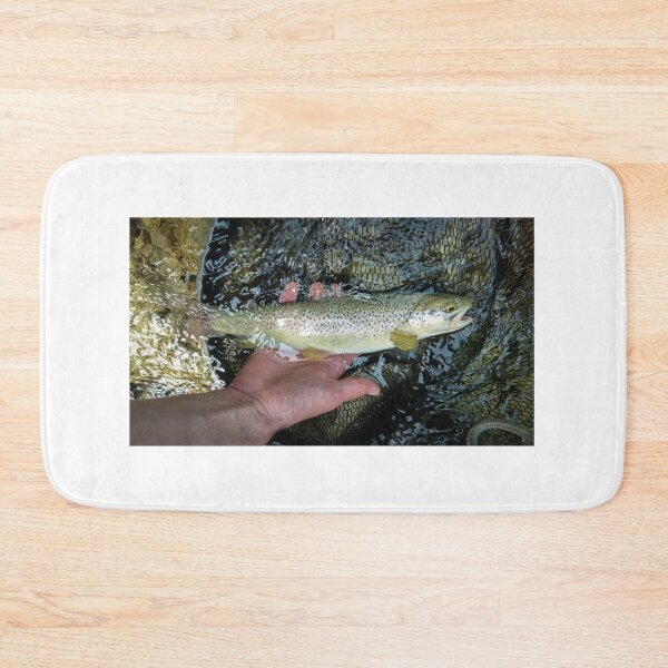 Item preview, A marble and brown trout hybrid fish in a fishing net after being caught on the Soca River, near Tolmin, Slovenia designed and sold by SnapTPhotograph.