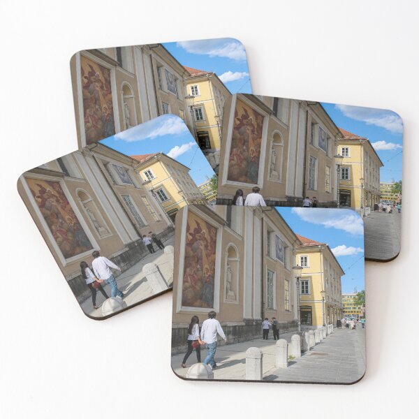 Item preview, Tourists walking past the art on the wall at Ljubljana Cathedral, Slovenia designed and sold by SnapTPhotograph.