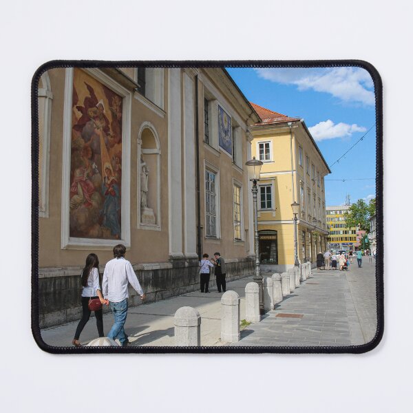 Item preview, Tourists walking past the art on the wall at Ljubljana Cathedral, Slovenia designed and sold by SnapTPhotograph.