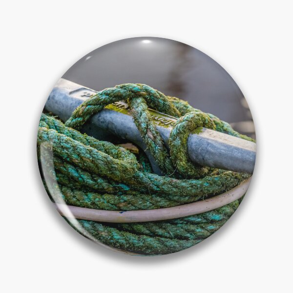 Item preview, Rope tied around a metal bollard mooring on a wooden jetty designed and sold by SnapTPhotograph.