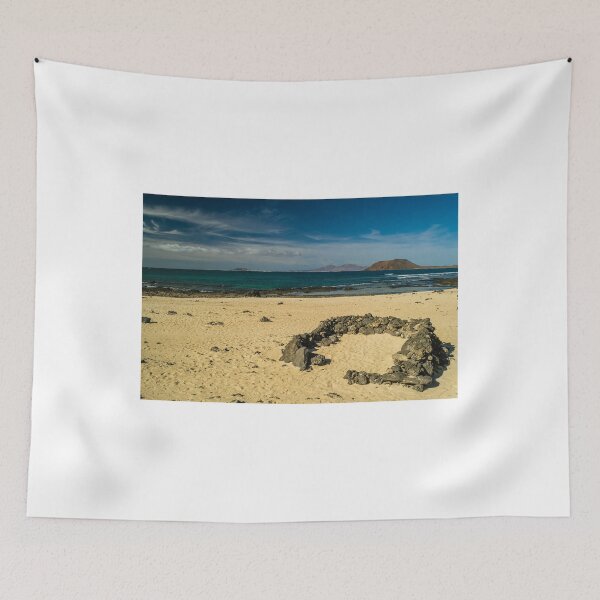 Item preview, Rock beach shelter on Fuerteventura. In the distance is the Island of Lobos and coast of Lanzarote designed and sold by MichaelBShannon.