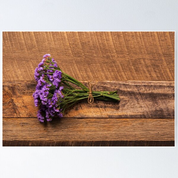 Item preview, Bundle of small purple flowers on wood background designed and sold by Adam Nixon.