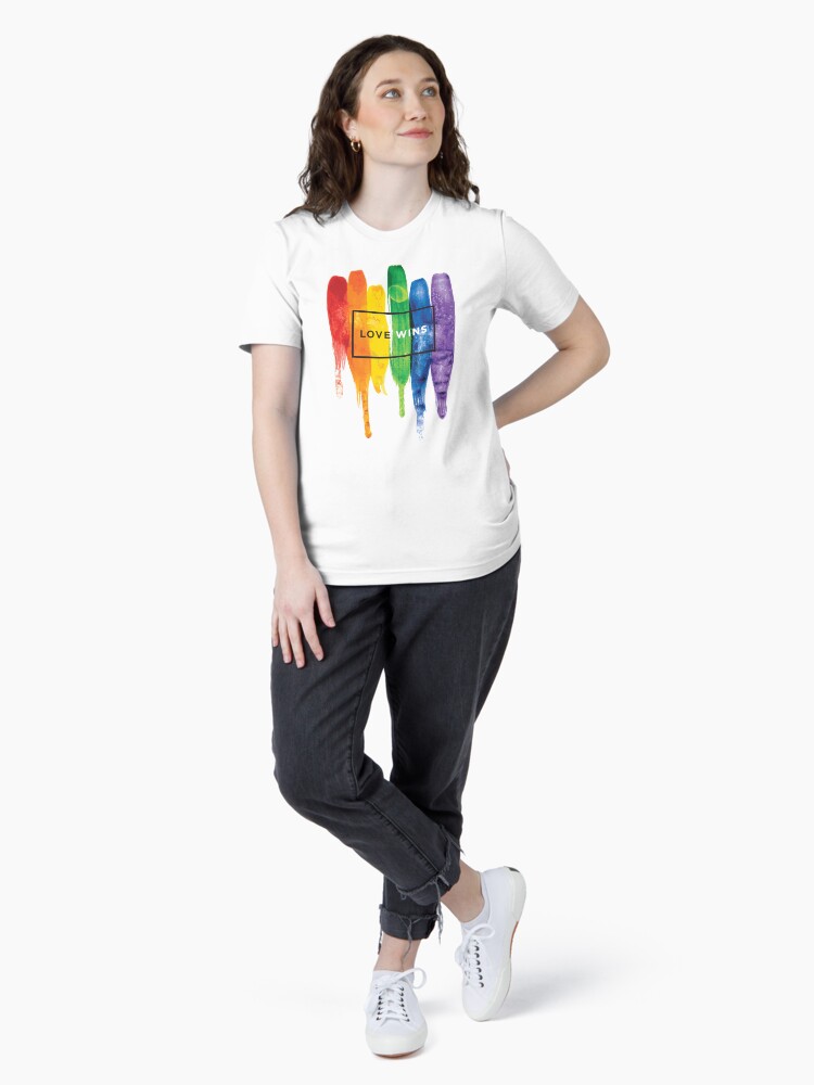 Thumbnail 4 of 7, Essential T-Shirt, Watercolor LGBT Love Wins Rainbow Paint Typographic designed and sold by LGBTIQ.