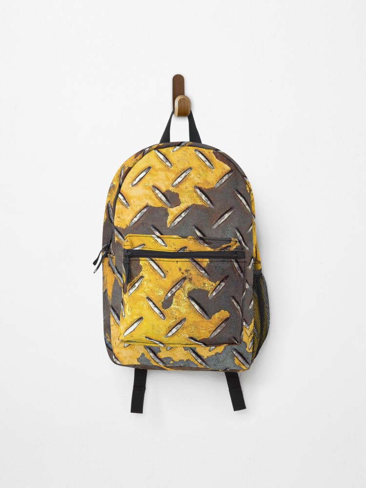 Diamond plate with worn yellow color. | Backpack