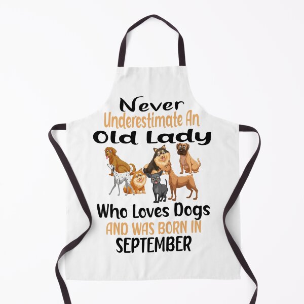 Item preview,  Never Underestimate An Old Lady Who Loves Dogs And Was Born In September designed and sold by boyastore.