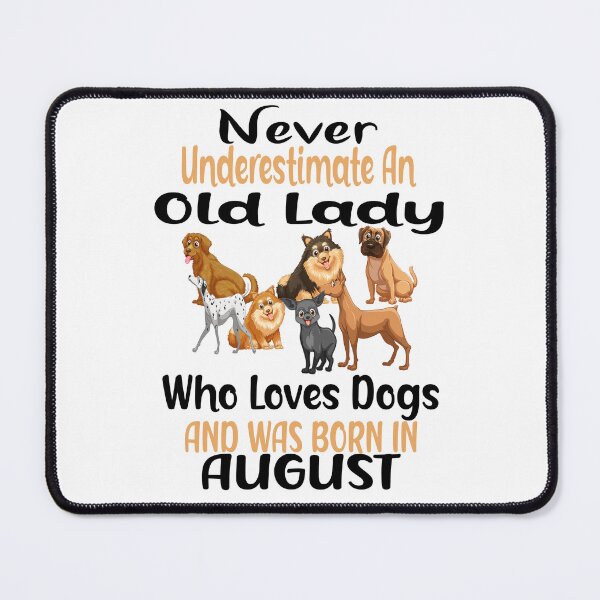 Item preview, Never Underestimate An Old Lady Who Loves Dogs And Was Born In August designed and sold by boyastore.