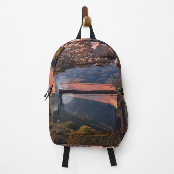 Item preview, Sunrise mountains over rocky river designed and sold by hardscuffle.