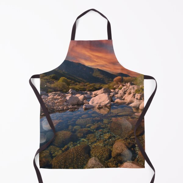 Item preview, Sunrise mountains over rocky river designed and sold by hardscuffle.