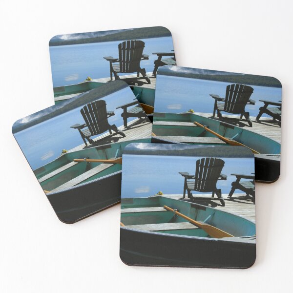 Item preview, Dock with Adirondack Chairs and green boat at lake designed and sold by hardscuffle.