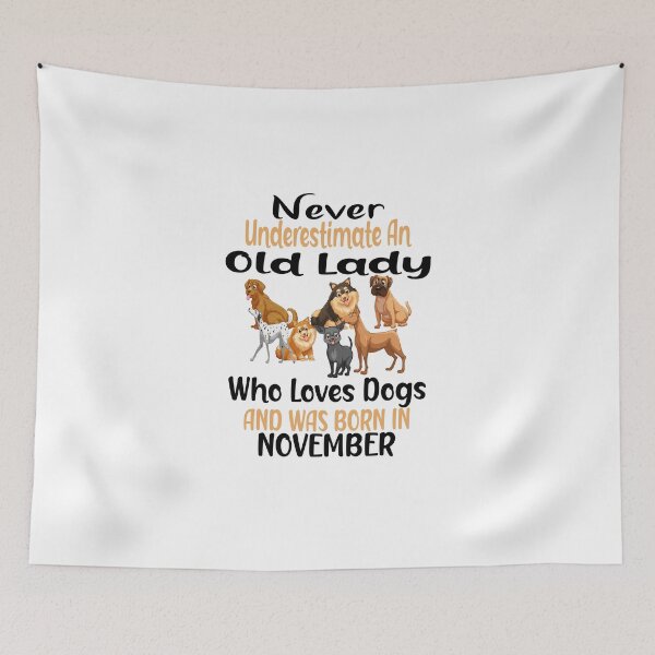 Item preview,   Never Underestimate An Old Lady Who Loves Dogs And Was Born In November designed and sold by boyastore.