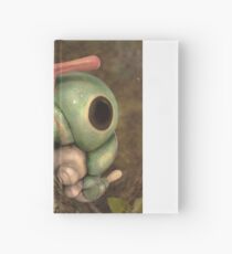 Caterpie on a tree Hardcover Journal