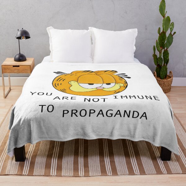 Item preview, you are not immune to propaganda - garfield  designed and sold by maskerclavinet.