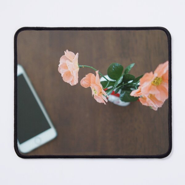 Item preview, flowers and smart phone on brown wooden table designed and sold by Waraphot.