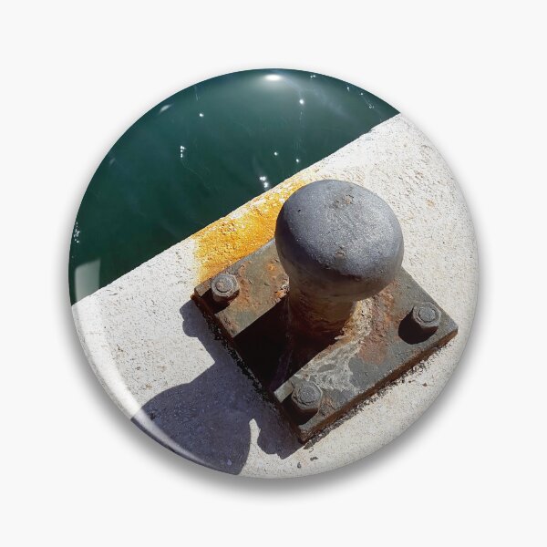 Item preview, Rusty boat bollard by a deep azure blue sea. designed and sold by janesg.