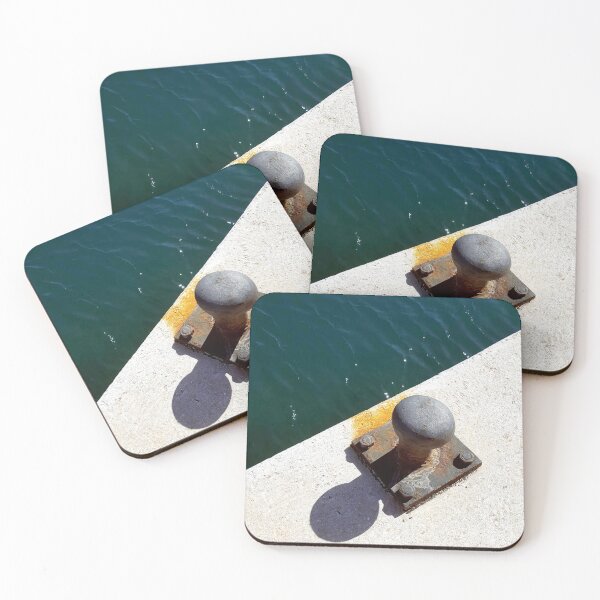 Item preview, Rusty boat bollard by a deep azure blue sea. designed and sold by janesg.