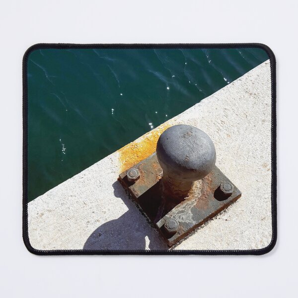 Item preview, Rusty boat bollard by a deep azure blue sea. designed and sold by janesg.