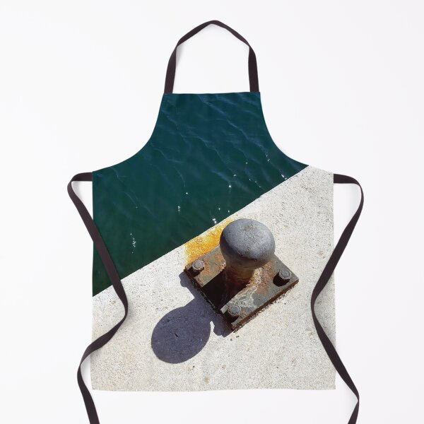 Item preview, Rusty boat bollard by a deep azure blue sea. designed and sold by janesg.