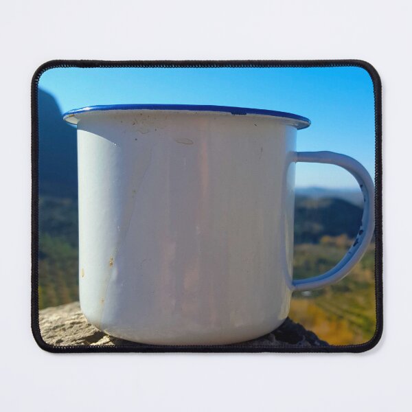 Item preview, A white enamel metal camping mug sat on a rock with mountain and blue sky. designed and sold by janesg.