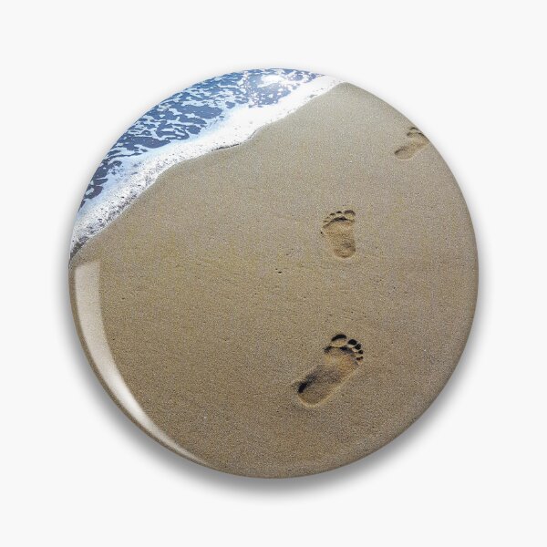 Item preview, Footprints on a beach. Foamy sea washing the prints away. designed and sold by janesg.