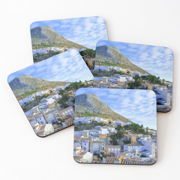 Item preview, Tradidional Spanish white village with white houses, mountain with castle and blue cloudy sky. designed and sold by janesg.