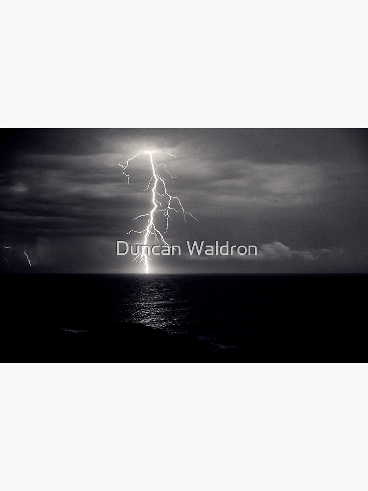 Dusk lightning over sea by DuncanW