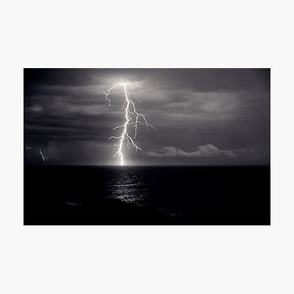 Dusk lightning over sea Photographic Print