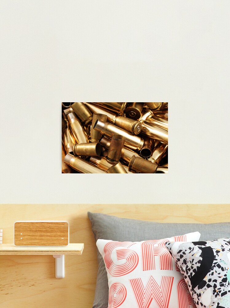 Empty, used, assorted, spent brass bullet casings Photographic