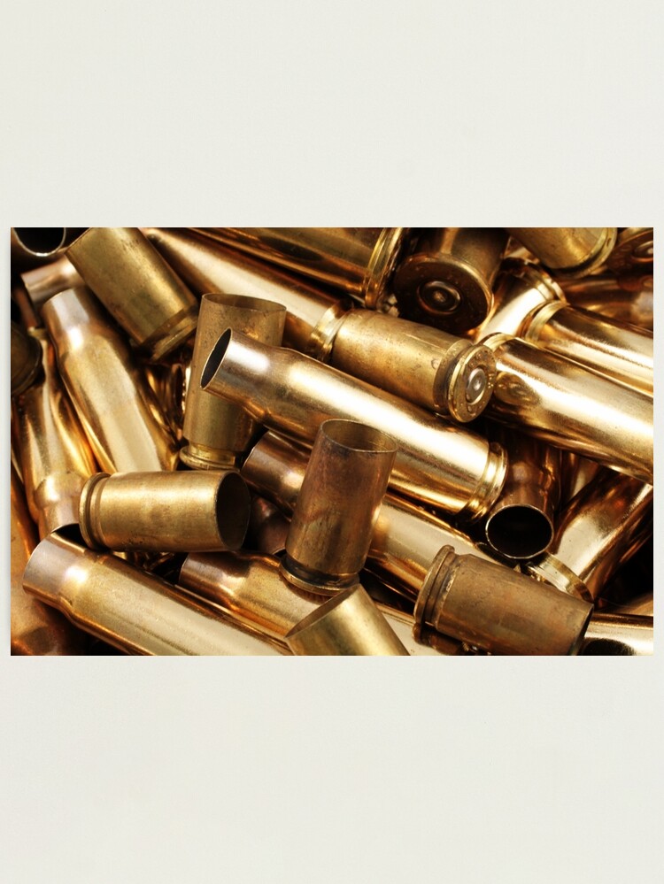 Empty, used, assorted, spent brass bullet casings Photographic Print for  Sale by tethysimaging