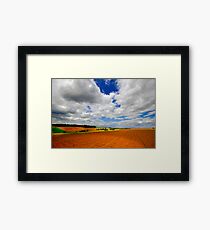 Between sky and hearth Framed Print