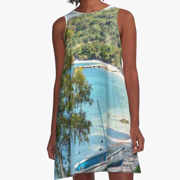 Item preview, Blue and White Greek Fishing Boat on an Idylic Beach, Corfu Island, Greece designed and sold by nickbrayimages.