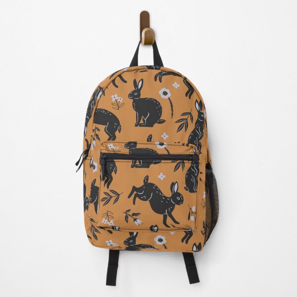 Item preview, pattern with black rabbits and flowers on an orange background designed and sold by burbura.
