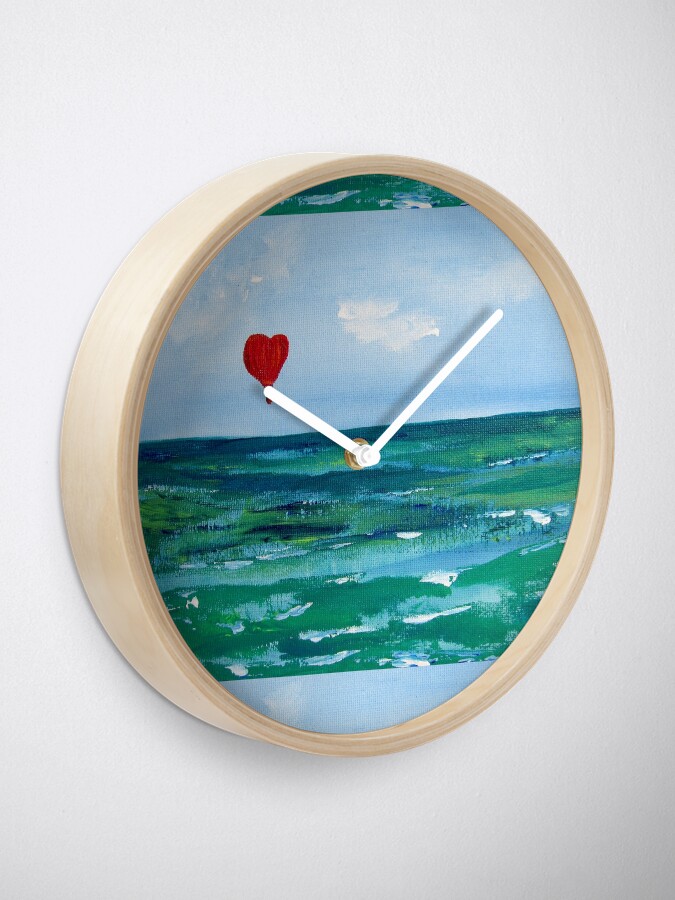 Alternate view of Hot air balloon over the sea Clock