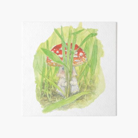 Little the mushroom hiding in the grass Art Board Print