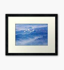 Mountains and clouds - aerial view Framed Print