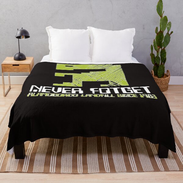 Item preview, E.T. (Never forget) 1983 - Video Game Legend (Ver. 2) Essential T-Shirt designed and sold by SETHLIVING5.
