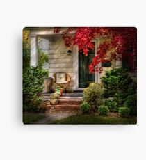 A chair and some flowers Canvas Print